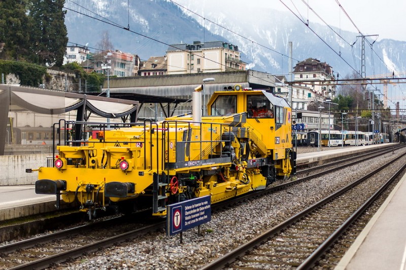 99 80 9125 006-3 D-JH (2014-02-05 gare de Montreux) Matisa R21 J-HUBErt (2).jpg